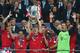 LONDON, ENGLAND - MAY 25: Bastian Schweinsteiger of Bayern Muenchen lifts the trophy in celebration alongside team mates after victory in the UEFA Champions League final match between Borussia Dortmund and FC Bayern Muenchen at Wembley Stadium on May 25, 2013 in London, United Kingdom. (Photo by Alex Grimm/Getty Images)