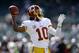 OAKLAND, CA - SEPTEMBER 29: Robert Griffin III #10 of the Washington Redskins warms up before their game against the Oakland Raiders at O.co Coliseum on September 29, 2013 in Oakland, California. (Photo by Ezra Shaw/Getty Images)
