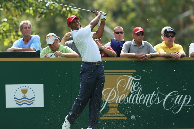 Hi-res-182600324-tiger-woods-of-the-u-s-team-hits-a-shot-during-a_crop_north