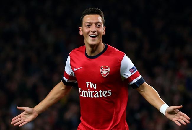 Hi-res-182601656-mesut-oezil-of-arsenal-celebrates-after-scoring-the_crop_north