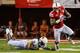 LINCOLN, NE - AUGUST 31: Running back Ameer Abdullah #8 of the Nebraska Cornhuskers runs past safety Marqueston Huff #2 of the Wyoming Cowboys during their game at Memorial Stadium on August 31, 2013 in Lincoln, Nebraska. (Photo by Eric Francis/Getty Images)