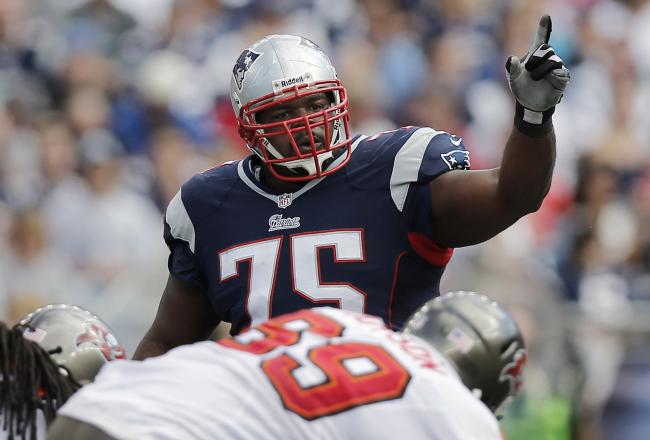 Hi-res-181708621-vince-wilfork-of-the-new-england-patriots-signals-to_crop_north