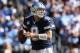 SAN DIEGO, CA - SEPTEMBER 29: Quarterback Tony Romo #9 of the Dallas Cowboys drops back to pass against the San Diego Chargers at Qualcomm Stadium on September 29, 2013 in San Diego, California. (Photo by Jeff Gross/Getty Images)
