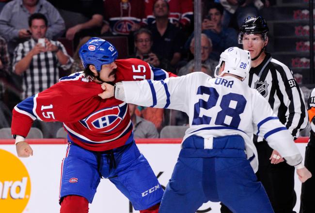 Hi-res-182616631-george-parros-of-the-montreal-canadiens-and-colton-orr_crop_north