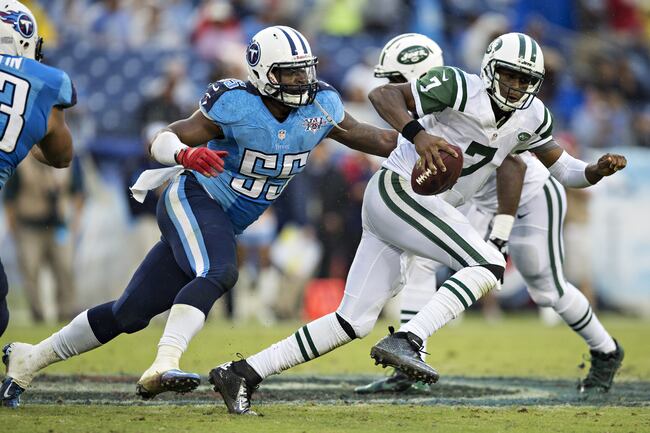 Hi-res-182444773-geno-smith-of-the-new-york-jets-tries-to-scramble-away_crop_north