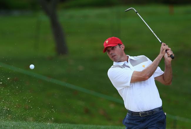 Hi-res-182605965-matt-kuchar-of-the-u-s-team-watches-a-bunker-shot_crop_north