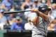 KANSAS CITY, MO - SEPTEMBER 5: Kendrys Morales #8 of the Seattle Mariners hits a RBI single in the first inning against the Kansas City Royals at Kauffman Stadium on September 5, 2013 in Kansas City, Missouri. (Photo by Ed Zurga/Getty Images)