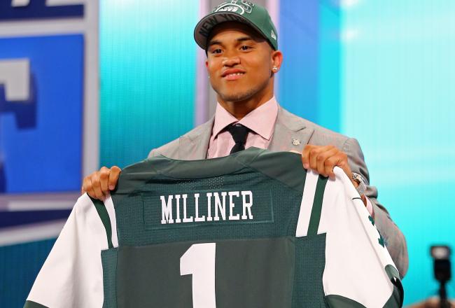 Hi-res-167510446-dee-milliner-of-the-alabama-crimson-holds-up-a-jersey_crop_north
