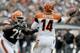 Sep 29, 2013; Cleveland, OH, USA; Cleveland Browns defensive end Ahtyba Rubin (71) pressures Cincinnati Bengals quarterback Andy Dalton (14) during the fourth quarter at FirstEnergy Stadium. The Browns beat the Bengals 17-6. Mandatory Credit: Ken Blaze-USA TODAY Sports
