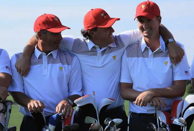 Hi-res-182595462-phil-mickelson-of-the-u-s-team-hiugs-his-captain-fred_crop_north