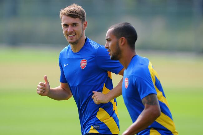 Hi-res-177972128-aaron-ramsey-and-theo-walcott-of-arsenal-warm-up-during_crop_north