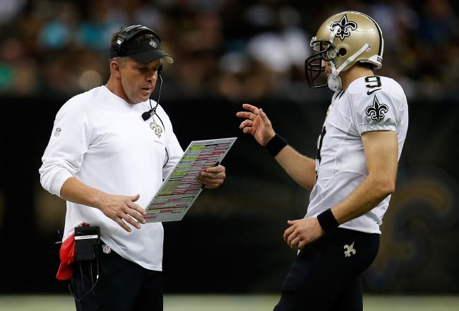 Hi-res-182567243-head-coach-sean-payton-talks-with-drew-brees-of-the-new_crop_north