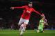 MANCHESTER, ENGLAND - SEPTEMBER 17: Wayne Rooney of Manchester United celebrates scoring his team's third goal during the UEFA Champions League Group A match between Manchester United and Bayer Leverkusen at Old Trafford on September 17, 2013 in Manchester, England. (Photo by Michael Regan/Getty Images)