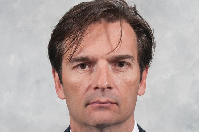 Hi-res-181457281-head-coach-dallas-eakins-of-the-edmonton-oilers-poses_crop_north