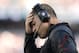 FOXBORO, MA - SEPTEMBER 22: Head coach Greg Schiano holds his head during the fourth quarter of their 23-3 loss to the New England Patriots at Gillette Stadium on September 22, 2013 in Foxboro, Massachusetts. (Photo by Winslow Townson/Getty Images)