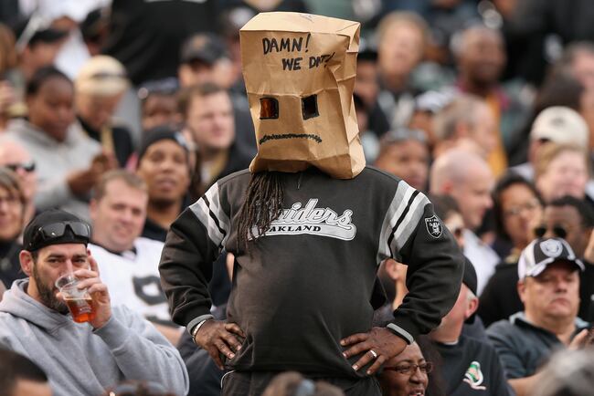 Hi-res-156664131-an-oakland-raiders-fan-covers-his-head-with-a-paper-bag_crop_north