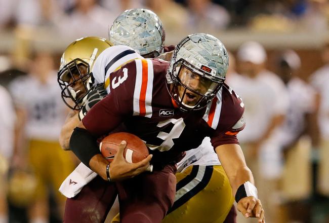 Hi-res-181965050-logan-thomas-of-the-virginia-tech-hokies-breaks-a_crop_north