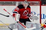 Hi-res-181951650-cory-schneider-of-the-new-jersey-devils-steers-the-puck_crop_north