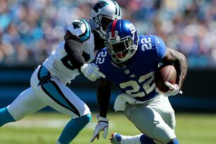 Hi-res-181572538-drayton-florence-of-the-carolina-panthers-goes-after_crop_north