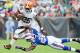 CLEVELAND, OH - SEPTEMBER 23: Running back Chris Ogbonnaya #25 of the Cleveland Browns jumps over defensive back Justin Rogers #26 of the Buffalo Bills during the first half at Cleveland Browns Stadium on September 23, 2012 in Cleveland, Ohio. (Photo by Jason Miller/Getty Images)