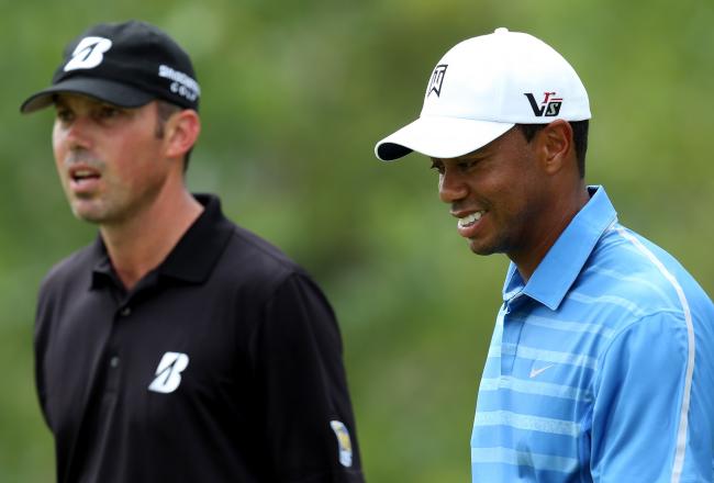 Hi-res-177214315-tiger-woods-and-matt-kuchar-of-the-united-states-look_crop_north