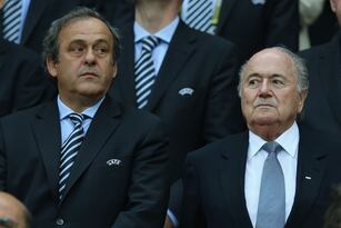Hi-res-147365153-president-michel-platini-and-fifa-president-sepp_crop_north