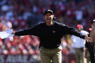 Hi-res-180899049-head-coach-jim-harbaugh-of-the-san-francisco-49ers_crop_north