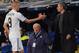 MADRID, SPAIN - MARCH 16: Karim Benzema of Real Madrid shakes hands with head coach Jose Mourinho after being substituted during the UEFA Champions League round of 16 second leg match between Real Madrid and Lyon at Estadio Santiago Bernabeu on March 16, 2011 in Madrid, Spain. (Photo by Denis Doyle/Getty Images)