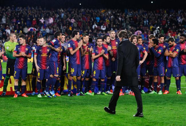 Hi-res-169175707-head-coach-tito-vilanova-walks-past-his-players-during_crop_north