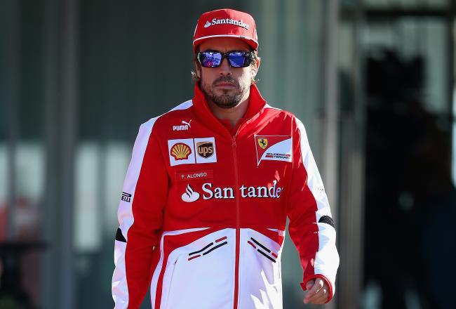 Hi-res-182971363-fernando-alonso-of-spain-and-ferrari-walks-in-the_crop_north