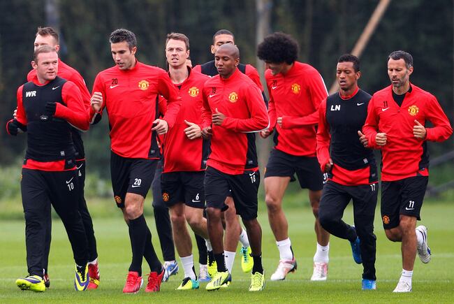 Hi-res-182578530-manchester-united-players-warm-up-during-a-training_crop_north