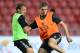BANGKOK, THAILAND - JULY 27: Jordan Henderson of Liverpool FC wins the ball over Lucas Leiva during a Liverpool FC training session at Rajamangala Stadium on July 27, 2013 in Bangkok, Thailand. (Photo by Thananuwat Srirasant/Getty Images)