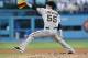 LOS ANGELES, CA - SEPTEMBER 14: Tim Lincecum #55 of the San Francisco Giants throws a pitch against the Los Angeles Dodgers at Dodger Stadium on September 14, 2013 in Los Angeles, California. (Photo by Stephen Dunn/Getty Images)