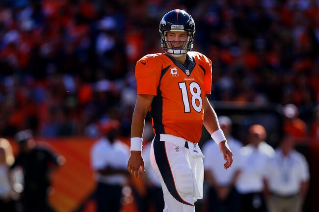 Hi-res-182444896-quarterback-peyton-manning-of-the-denver-broncos-smiles_crop_north