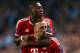 MANCHESTER, ENGLAND - OCTOBER 02: Franck Ribery of Muenchen celebrates scoring the opening goal with David Alaba of Muenchen during the UEFA Champions League Group D match between Manchester City and FC Bayern Muenchen at Etihad Stadium on October 2, 2013 in Manchester, England. (Photo by Julian Finney/Getty Images)
