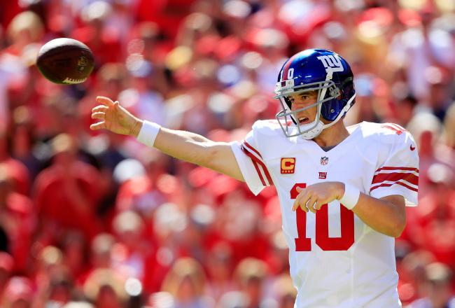 Hi-res-182322672-quarterback-eli-manning-of-the-new-york-giants-passes_crop_north