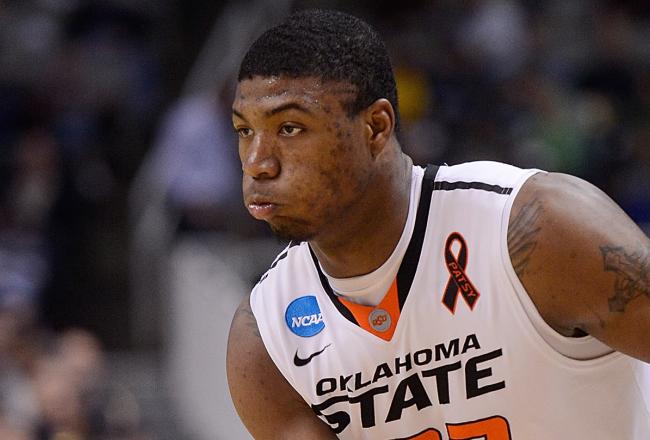 Hi-res-164287089-marcus-smart-of-the-oklahoma-state-cowboys-looks-to_crop_north