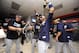 CLEVELAND, OH - OCTOBER 2: Yunel Escobar #11 of the Tampa Bay Rays celebrates with teammates in the clubhouse after defeating the Cleveland Indians 4-0 at Progressive Field on October 2, 2013 in Cleveland, Ohio. (Photo by Jason Miller/Getty Images)