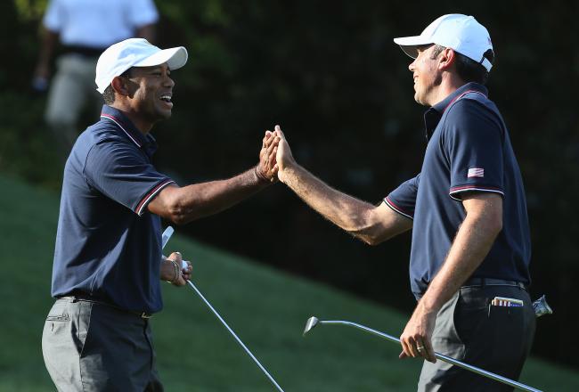 Hi-res-183003266-tiger-woods-and-matt-kuchar-of-the-u-s-team-celebrate_crop_north