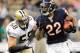 NEW ORLEANS, LA - SEPTEMBER 18: Scott Shanle #58 of the New Orleans Saints pursues Matt Forte #22 of the Chicago Bears at the Louisiana Superdome on September 18, 2011 in New Orleans, Louisiana. The Saints defeated the Bears 30-13. (Photo by Stacy Revere/Getty Images)