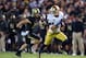 Sep 14, 2013; West Lafayette, IN, USA; Notre Dame Fighting Irish cornerback Bennett Jackson (2) runs for a touchdown after intercepting a pass intended for Purdue Boilermakers wide receiver Shane Mikeskey (87) in the fourth quarter at Ross-Ade Stadium. Notre Dame won 31-24. Mandatory Credit: Matt Cashore-USA TODAY Sports
