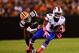 Oct 3, 2013; Cleveland, OH, USA; Buffalo Bills wide receiver T.J. Graham (11) gets away from Cleveland Browns cornerback Buster Skrine (22) during the first quarter at FirstEnergy Stadium. Mandatory Credit: Andrew Weber-USA TODAY Sports