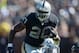 Sep 15, 2013; Oakland, CA, USA; Oakland Raiders running back Darren McFadden (20) carries the ball in the first half against the Jacksonville Jaguars at O.co Coliseum. Mandatory Credit: Kirby Lee-USA TODAY Sports