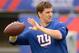 Sep 15, 2013; East Rutherford, NJ, USA; New York Giants quarterback Eli Manning (10) warms up before the game against the Denver Broncos at MetLife Stadium. Mandatory Credit: Robert Deutsch-USA TODAY Sports