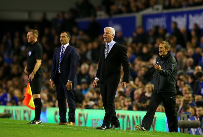 Hi-res-182552130-manager-alan-pardew-of-newcastle-shouts-instructions-to_crop_north