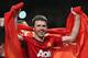 MANCHESTER, ENGLAND - APRIL 22: Michael Carrick of Manchester United celebrates victory and winning the Premier League title after the Barclays Premier League match between Manchester United and Aston Villa at Old Trafford on April 22, 2013 in Manchester, England. (Photo by Alex Livesey/Getty Images)
