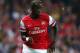 LONDON, ENGLAND - OCTOBER 01: Bacary Sagna of Arsenal runs with the ball during UEFA Champions League Group F match between Arsenal FC and SSC Napoli at Emirates Stadium on October 1, 2013 in London, England. (Photo by Paul Gilham/Getty Images)