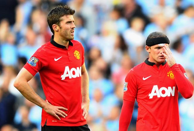 Hi-res-181548710-wayne-rooney-and-michael-carrick-of-manchester-united_crop_north