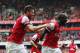 LONDON, ENGLAND - SEPTEMBER 22: Bacary Sagna of Arsenal (R) celebrates with Olivier Giroud as he scores their third goal during the Barclays Premier League match between Arsenal and Stoke City at Emirates Stadium on September 22, 2013 in London, England. (Photo by Ian Walton/Getty Images)