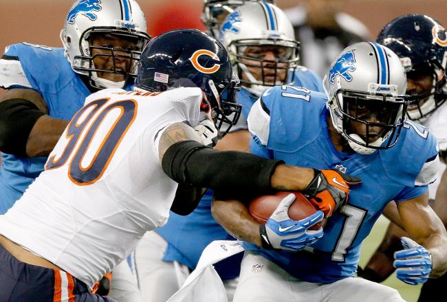 Hi-res-182300201-julius-peppers-of-the-chicago-bears-grabs-a-hold-of_crop_north